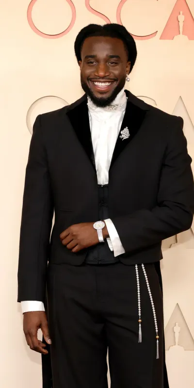 <p style="font-weight: 400;">Shaboozey wears Chopard L’Heure du Diamant Collection watch in white gold, set with 7.04-carats of diamonds and vintage brooch from Briony Raymond Vintage</p>
<p> </p>