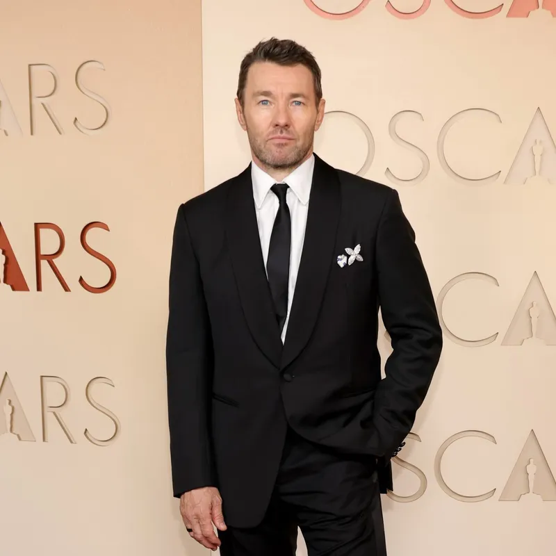 <p>Joel Edgerton wears Louis Vuitton Les Honneurs brooch, set with sapphires and diamonds</p>