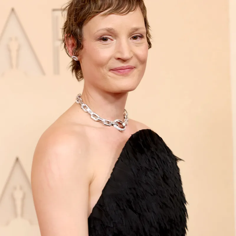 <p>Vicky Krieps wears Messika Groove necklace, Hypnotic Scale earrings, Dancing Moon two-finger ring and Moderniste two-finger ring</p>