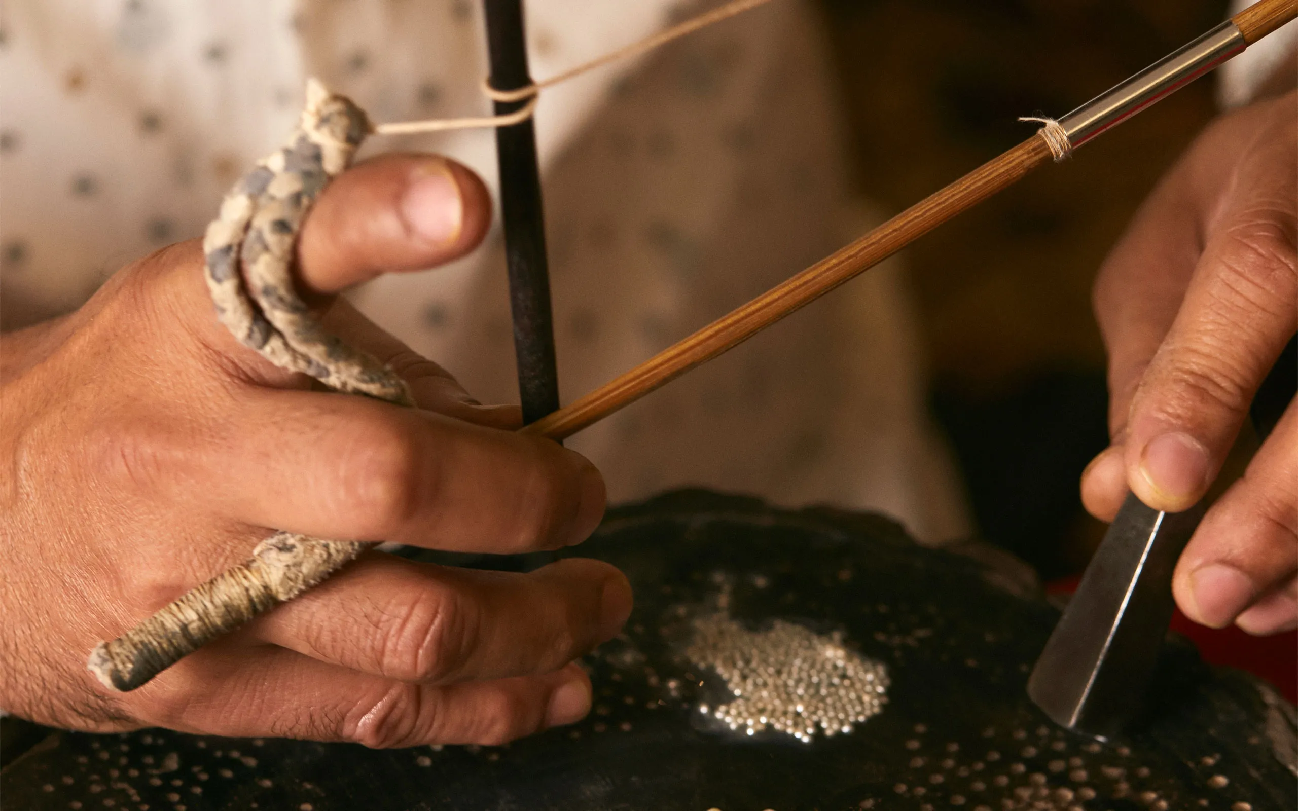 <p>The holes are drilled using a traditional hand drill</p>