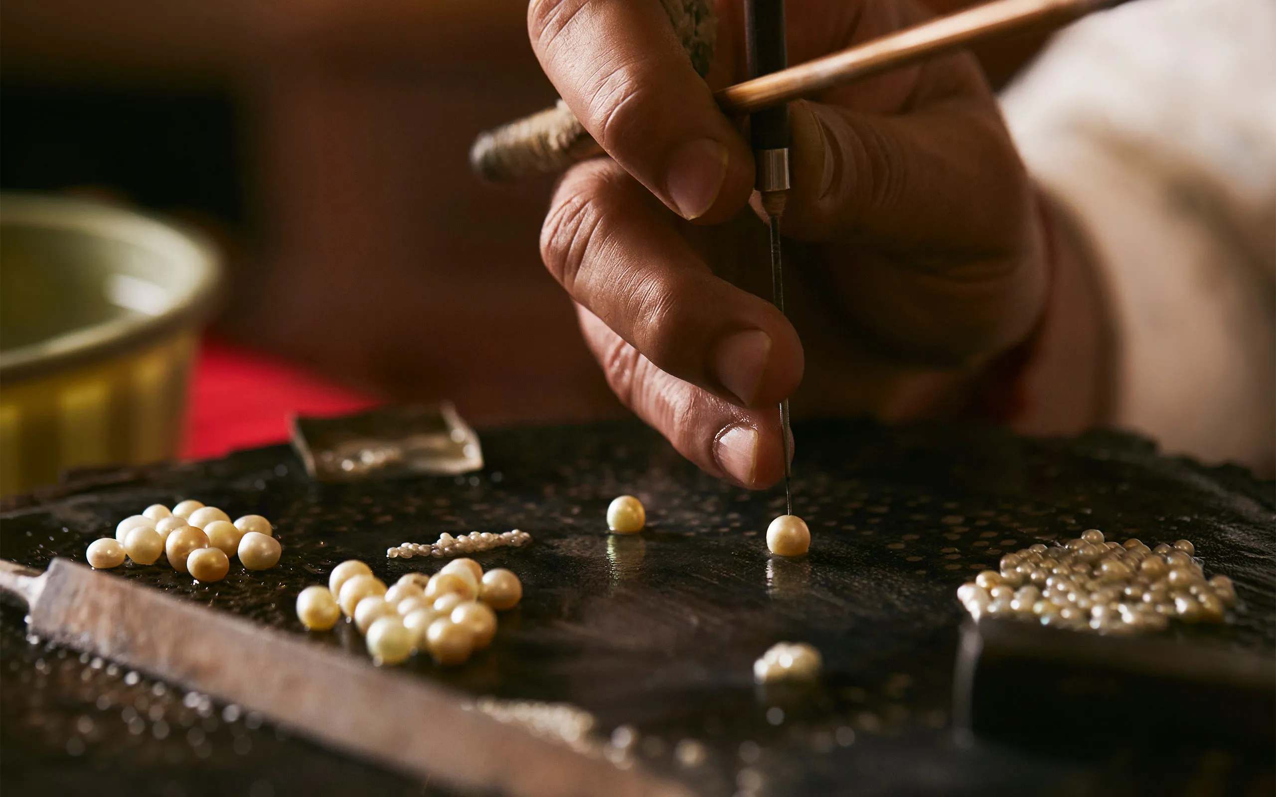 <p>Al Mahmood uses this revered, centuries-old technique to drill all of its natural pearls</p>