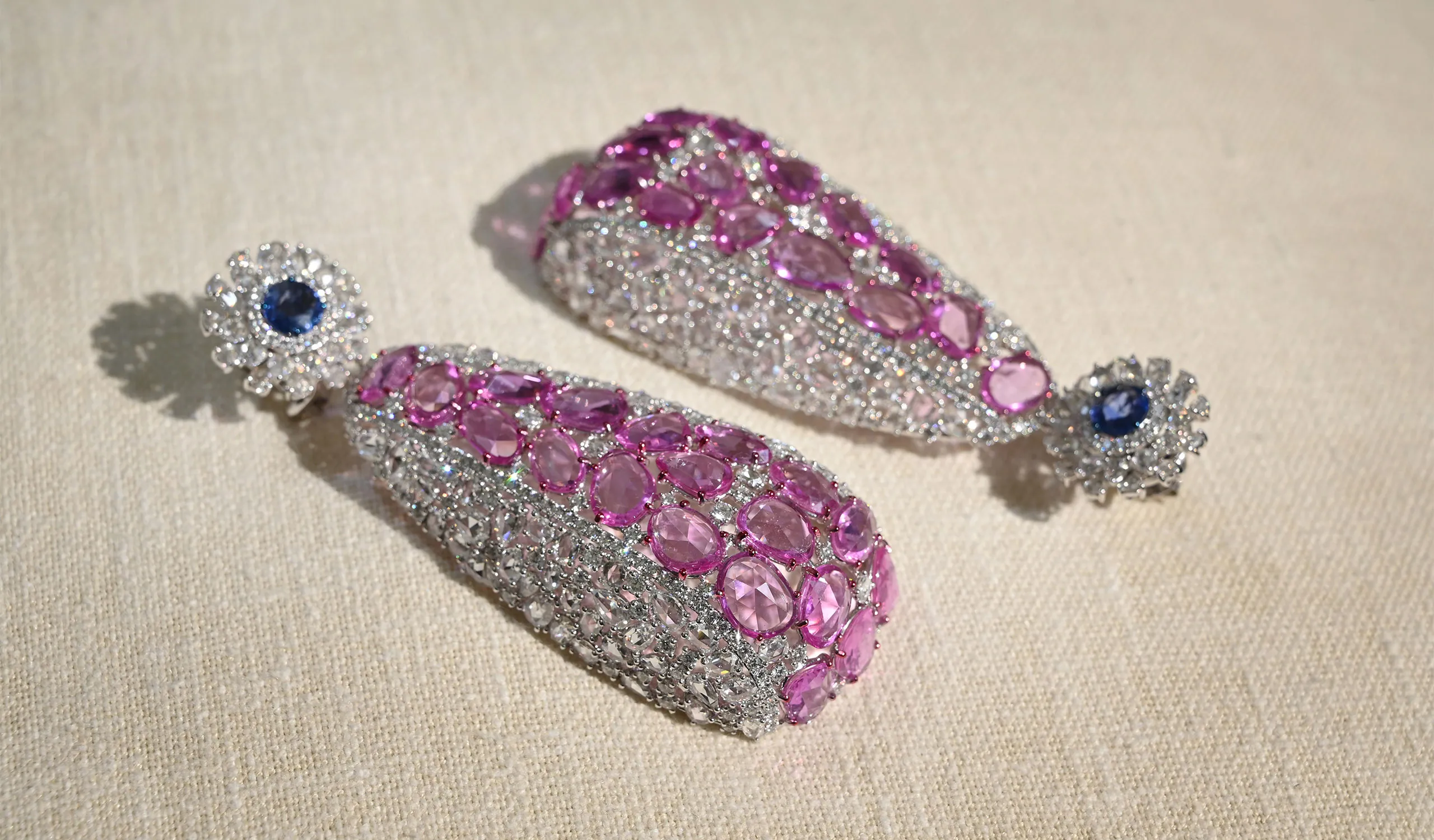 <p>A pair of Diviano earrings in the Diviano One Collection, set with blue sapphires, pink sapphires and rose-cut diamonds, crafted in 18k white gold </p>