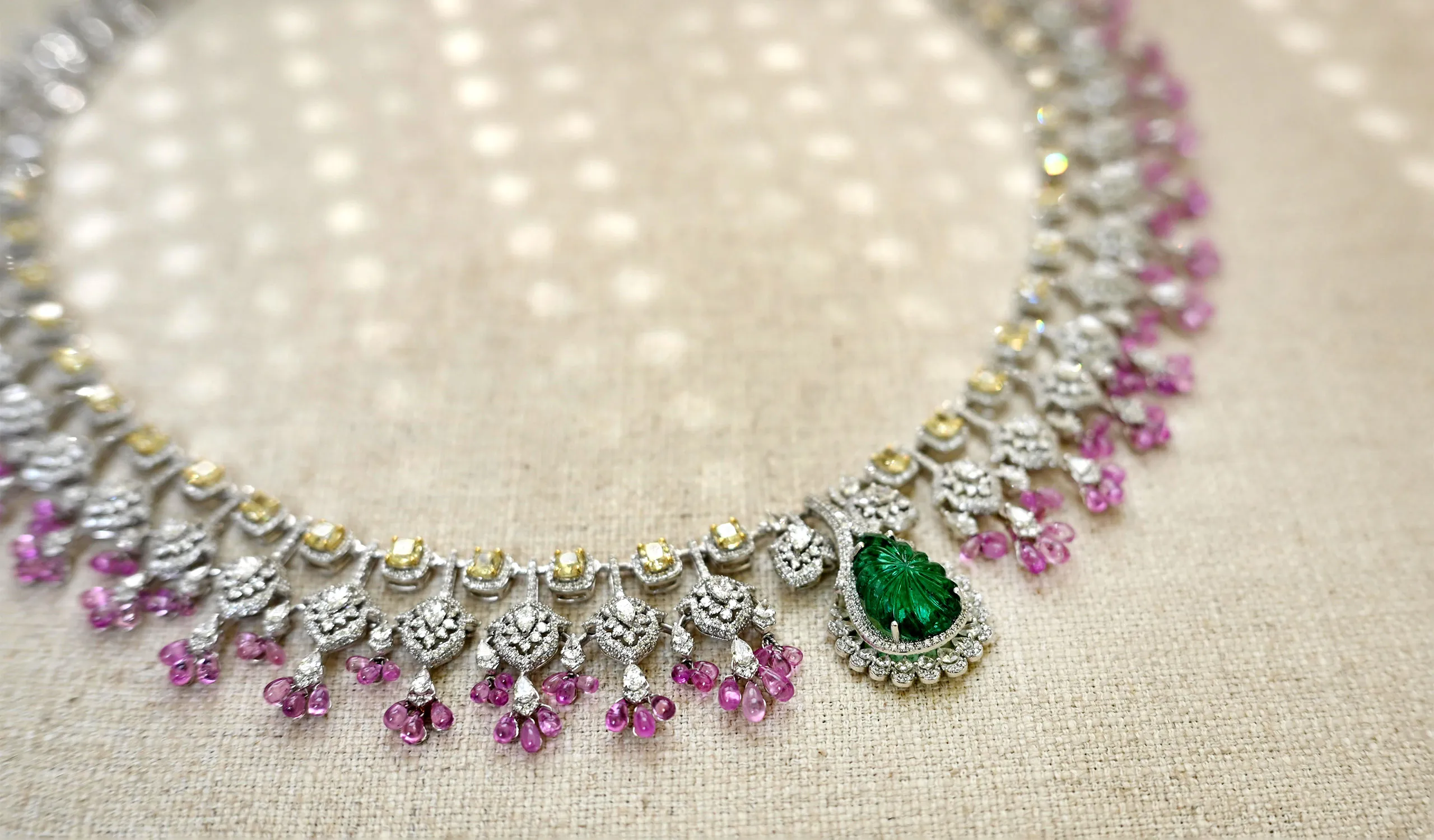 <p>Indian jeweller Diviano creates pieces that are designed to be inherited by future generations, such as this diamond, pink sapphire and emerald necklace</p>
