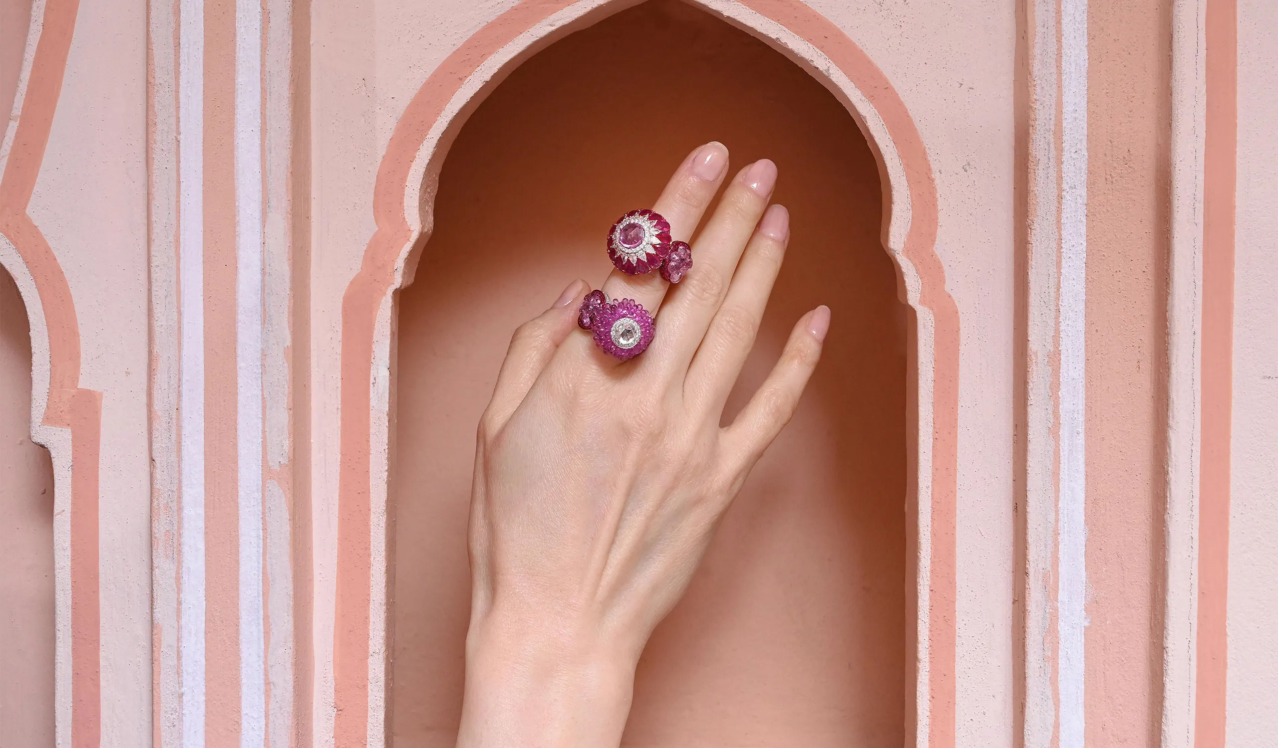 <p>These pink sapphire, diamond and ruby rings by Diviano feature the brand’s Lamella technique in which rose-cut gemstones are drilled and individually articulated, allowing each stone to overlap the next</p>