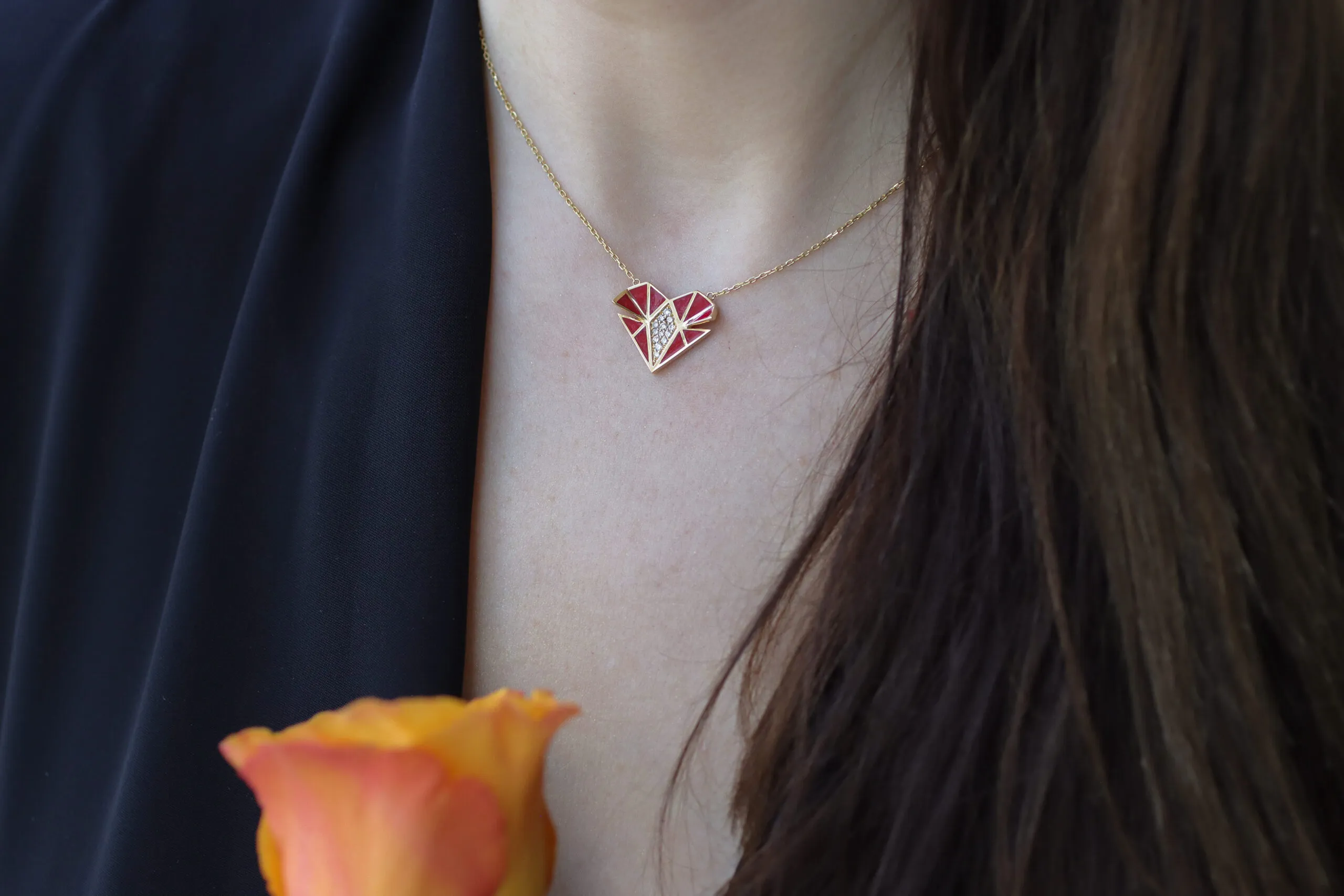 <p>The Vol O Vent Heart necklace in 18k yellow gold, enamel and diamonds</p>