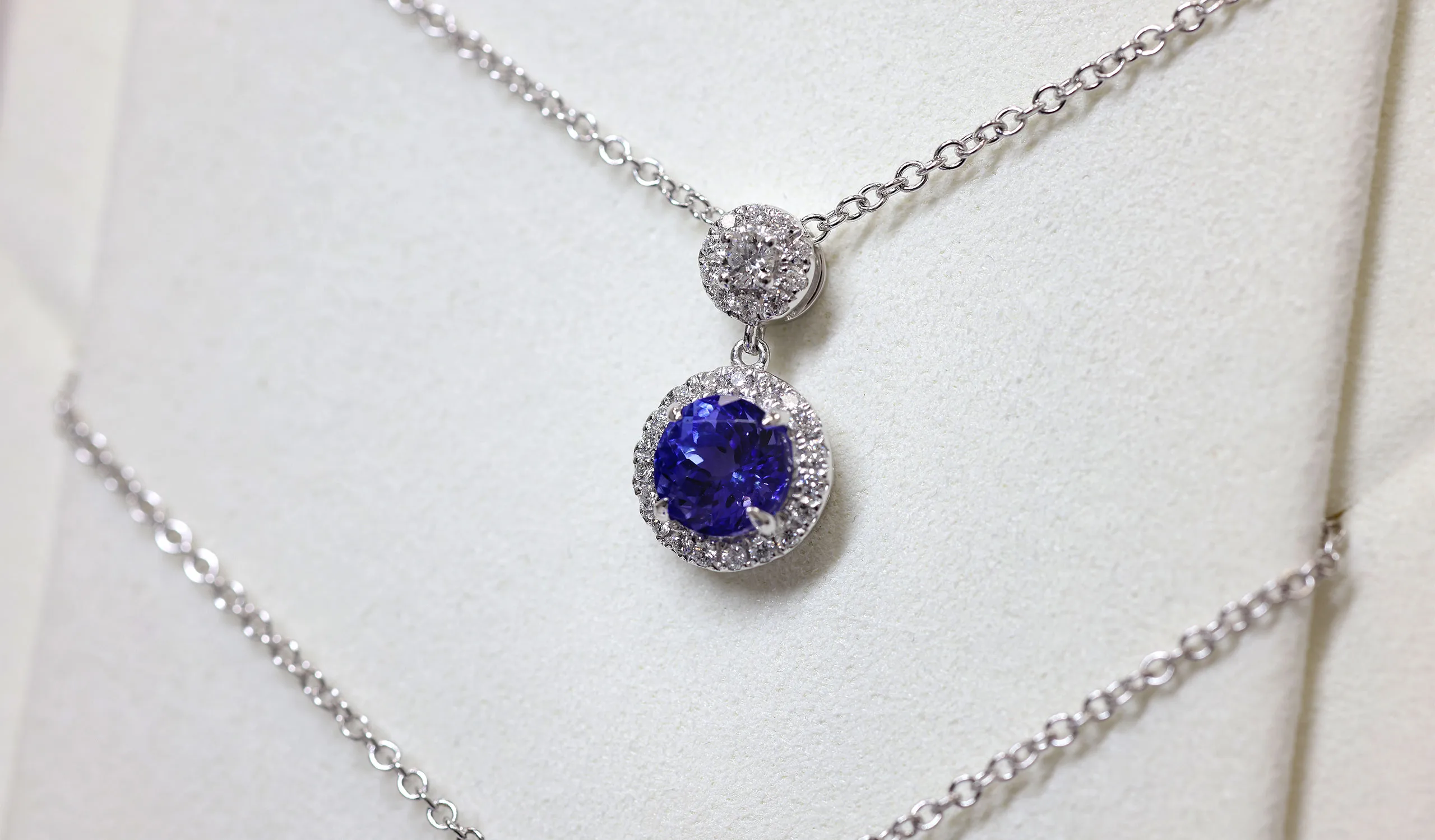 <p>An elegant tanzanite pendant with white diamonds, crafted by the Royal Touch Group</p>
