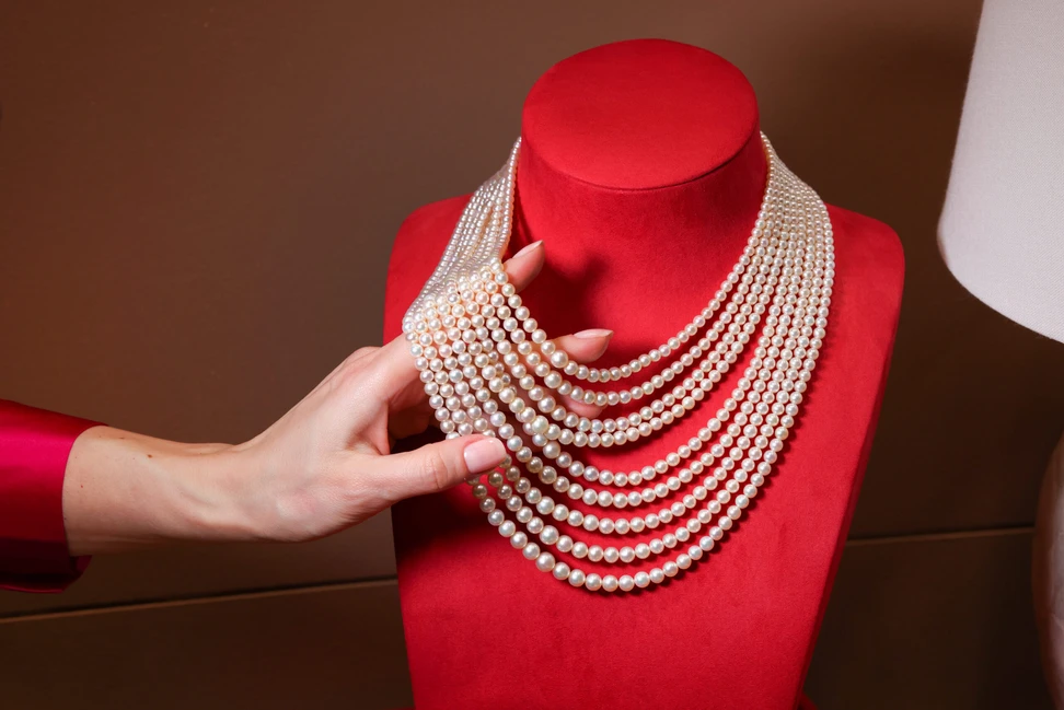 <p>Al Mahmood completed the breathtaking nine-row natural pearl necklace just weeks before Jewellery Arabia</p>