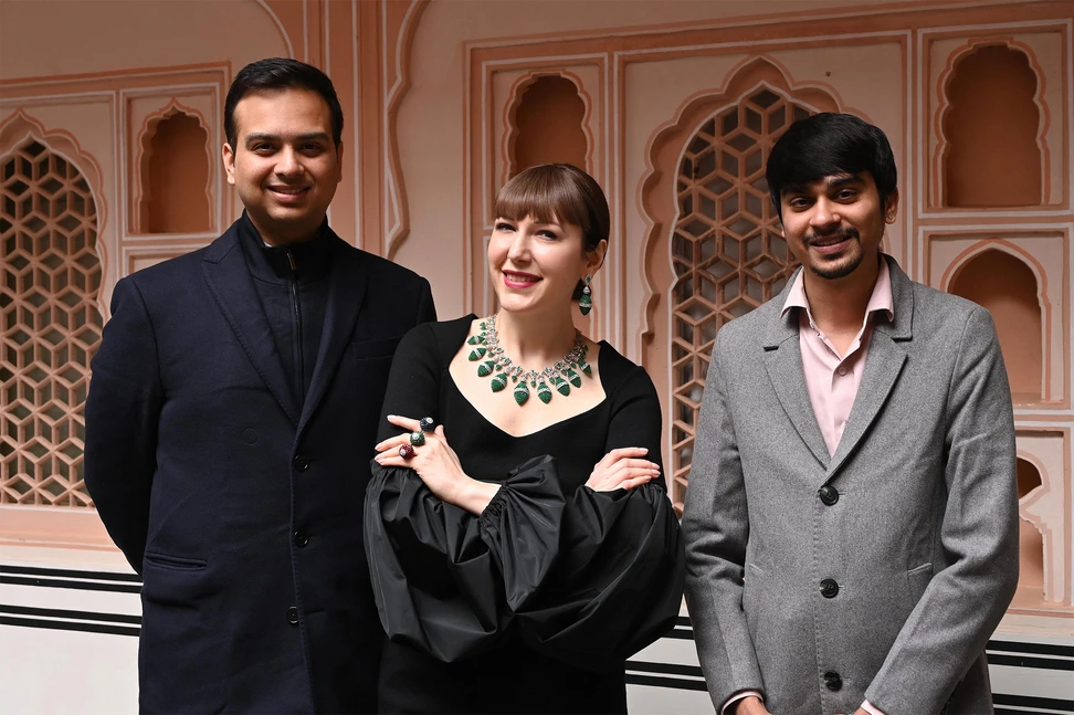 <p>Katerina Perez with Yash Hirawat and Aditya Hirawat of Diviano</p>