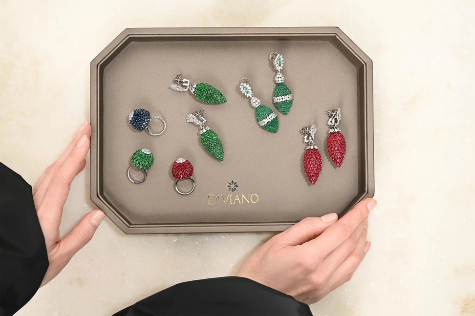 <p>Diviano rings and earrings from the Plume Collection, featuring a proprietary sequential layering of marquise-shaped gemstones in a three-dimensional layout</p>