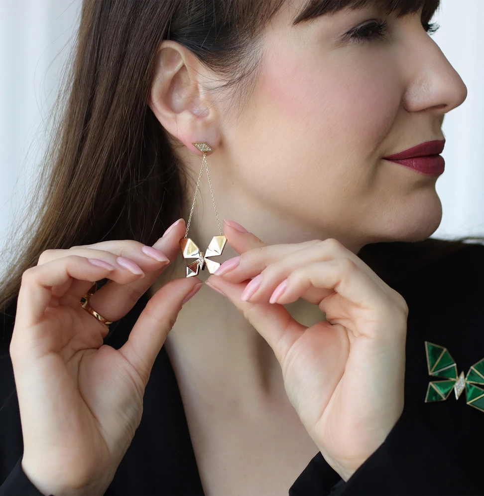 <p>Offering two different ways to wear, they can be flipped round to reveal a gold-and-diamond butterfly</p>