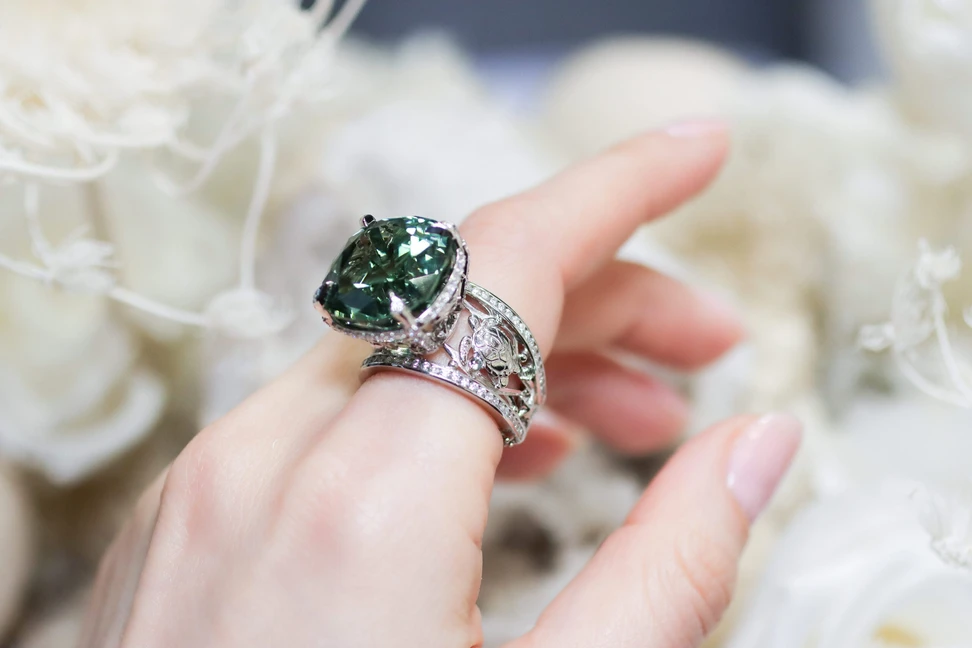 <p>The Palm Beach Gems by Nicole Exuma ring, set with a 25 carat cuprian tourmaline and accented with diamonds and sapphires, drawing inspiration from crystal clear Caribbean waters</p>