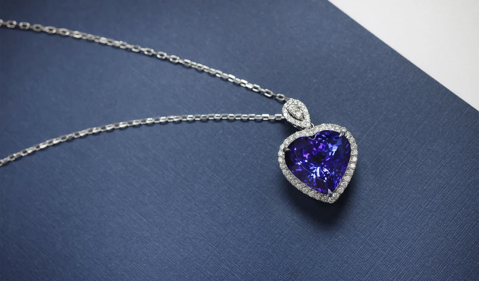<p>A heart-shaped tanzanite pendant with the gemstone’s characteristic blue-violet hue, crafted by the Royal Touch Group</p>
