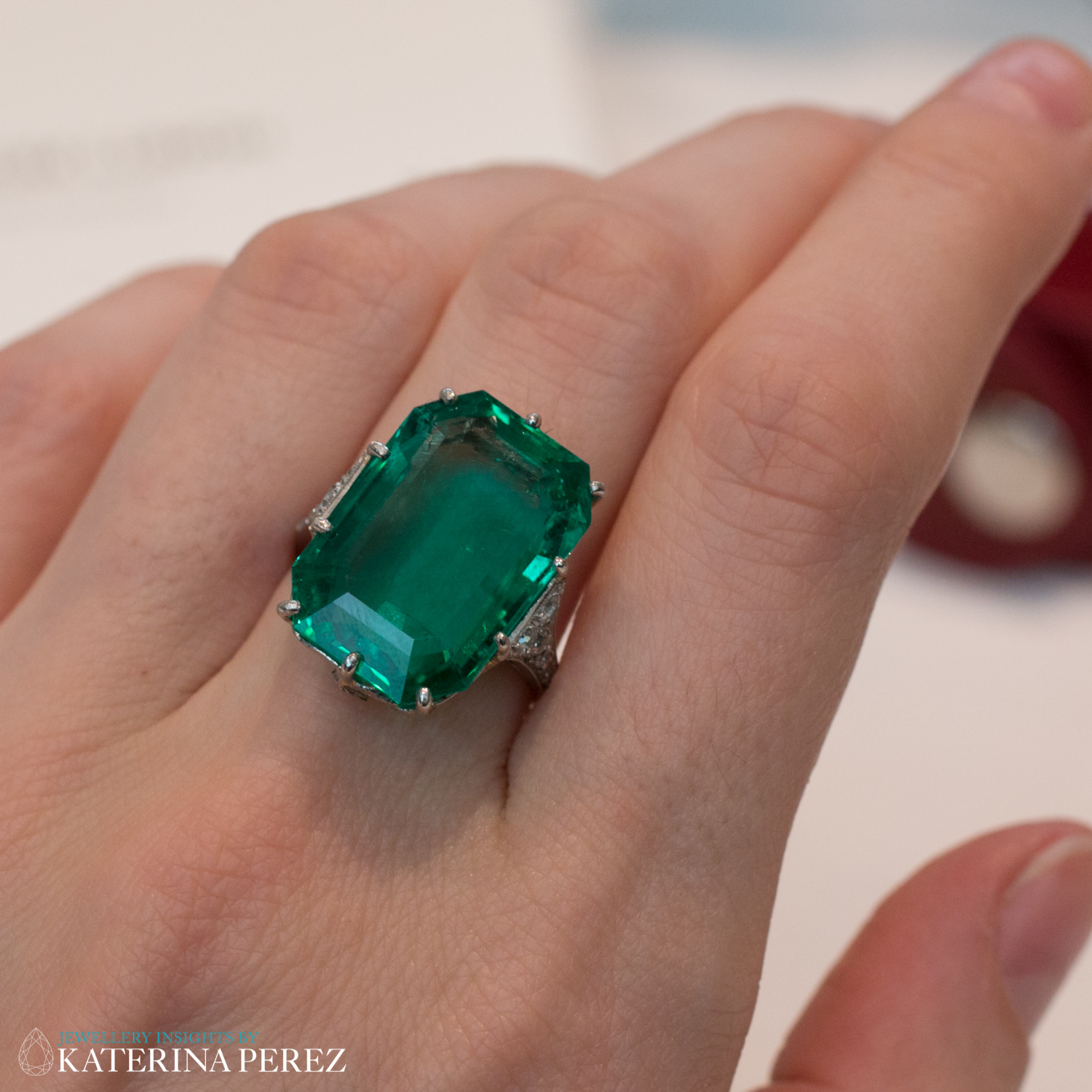 Art Deco Single Stone Emerald Ring, Circa 1920. Featuring step-cut emerald, weighing 14.70 carats and decorated with rose cut diamonds