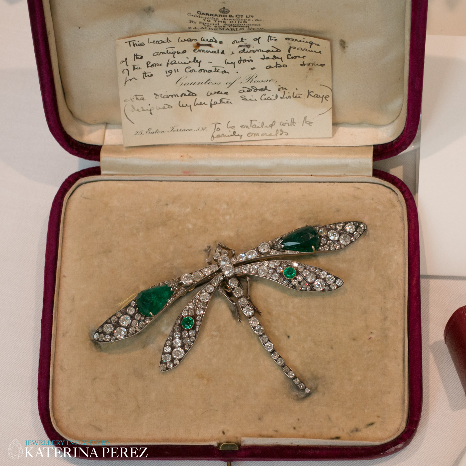 An Emerald and Diamond Dragonfly Brooch, circa 1910. Mounted in silver and yellow gold, diamonds total 13.25 carats
