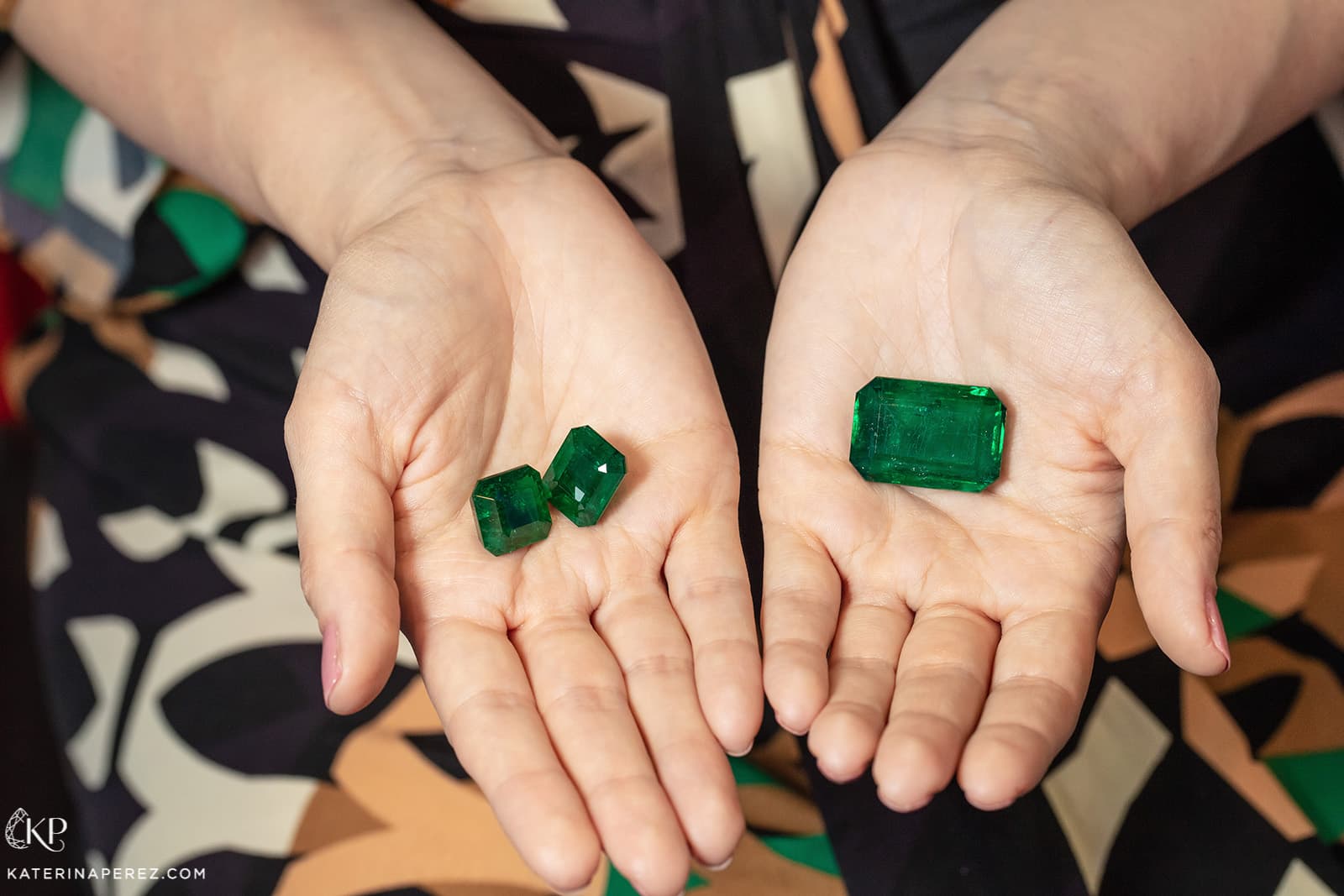 Zambian emeralds, a pair totalling 80 cts and a 128 cts gem, available at P&P Gems. Photo by Simon Martner