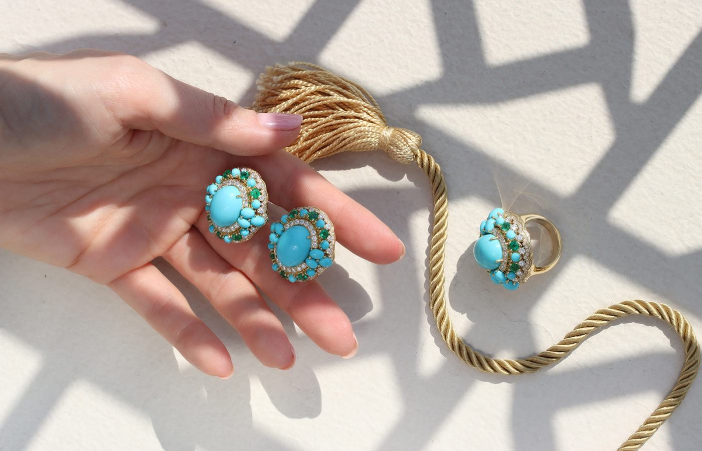 A pair of turquoise, emerald and diamond earrings in 18k yellow gold by Veschetti with a matching cocktail ring