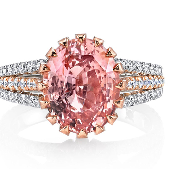 Ring with oval cut 5.73ct Padparadscha sapphire and diamonds in 18k rose gold and platinum