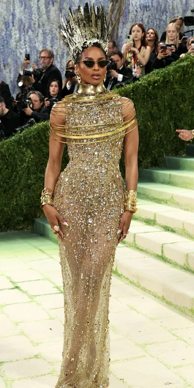 <p>Ciara channels ancient Egyptian royalty at the Met Gala 2026 with gold cuffs stacked on each wrist</p>