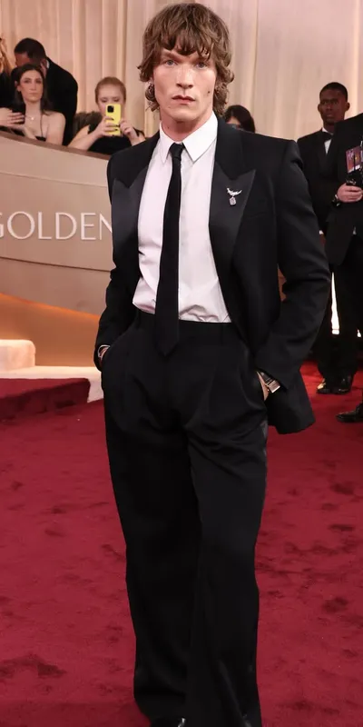 <p>Connor Storrie wore a Jean Schlumberger for Tiffany & Co. Bird on a Rock brooch</p>