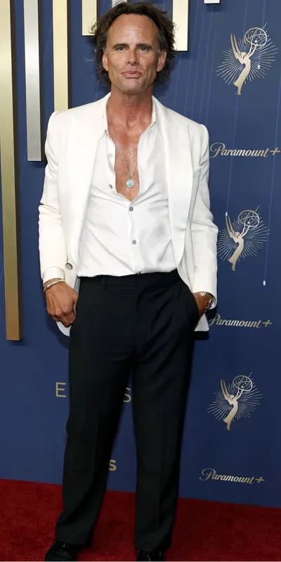 <p>Actor Walter Goggins at the 2025 Emmy Awards wearing a malachite necklace, rings and a bracelet by David Yurman, set in 18k yellow gold</p>
