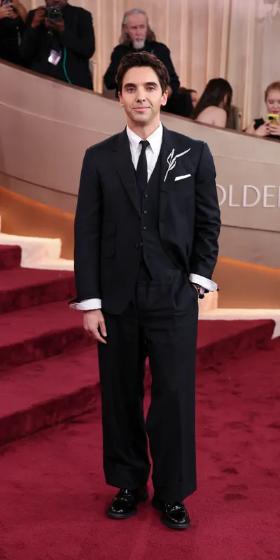 <p>Paul W. Downs wore the Boucheron Roseau brooch from the Histoire de Style, Untamed Nature High Jewellery collection</p>