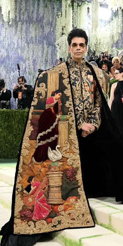 <p>Karan Johar wore custom couture, created by his long-time friend Manish Malhotra, together with a neckpiece and rings from his own brand, Tyaani Jewellery</p>