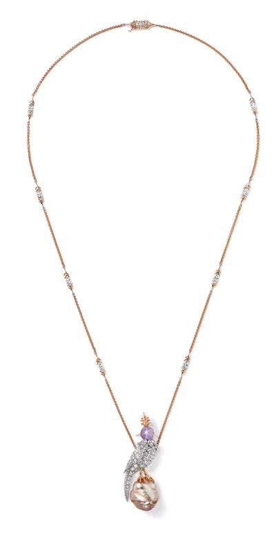 <p>Tiffany & Co. Bird on a Pearl high jewellery pendant in platinum and 18k rose gold with a white and light orangy brown baroque natural saltwater pearl of 14.37 carats, a star sapphire and diamonds</p>
