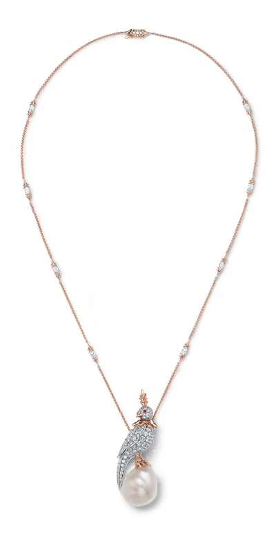 <p>Tiffany & Co. Bird on a Pearl high jewellery pendant in platinum and 18k rose gold with a white and cream baroque natural saltwater pearl of 29.25 carats, Fancy Brown diamonds, rubies and diamonds</p>