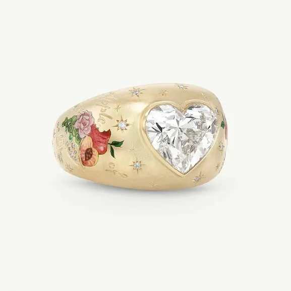 <p>Cece Jewellery Apple of my Eye ring, set with a 3 carat heart shape diamond in 18K yellow gold.</p>
