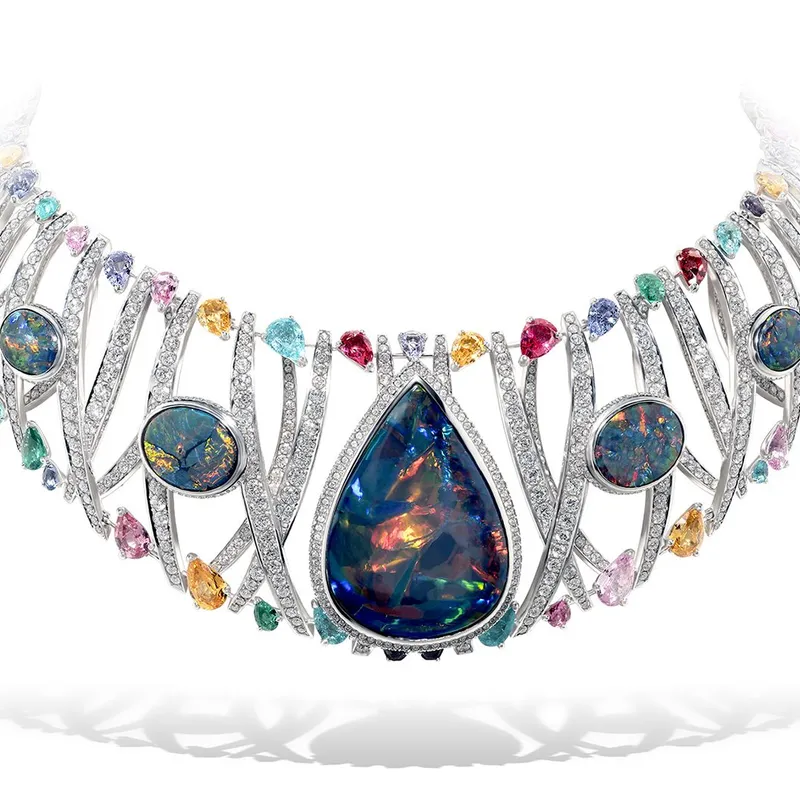Ribbon High Jewellery necklace from the 60th Anniversary High Jewellery collection set with a 77.57-ct Australian black opal, diamond, pink and blue spinel, a 7.68-ct pear shaped garnet and Paraiba tourmaline