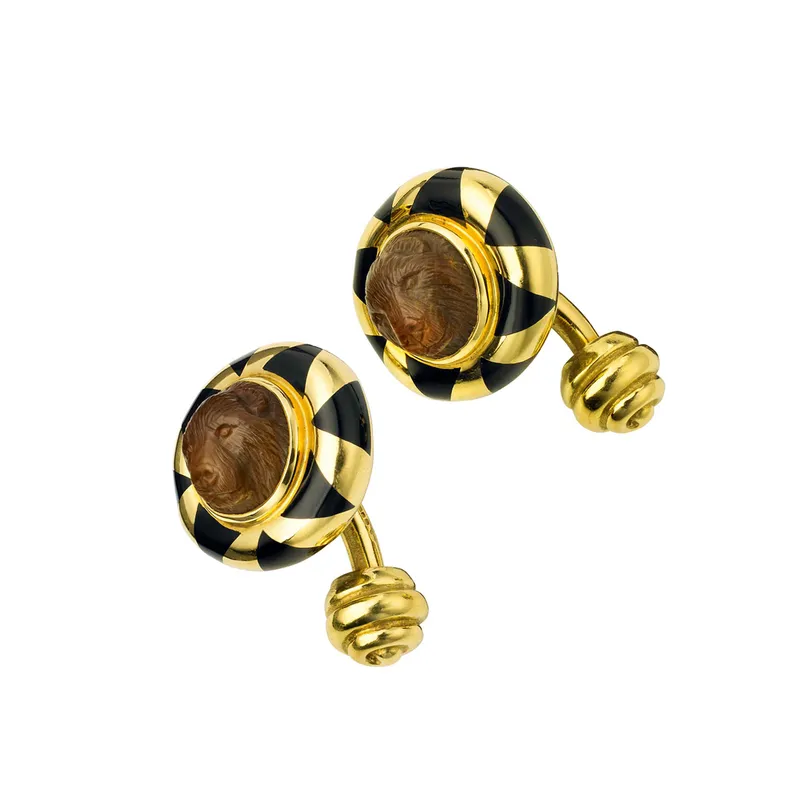 <p>Cufflinks with bear’s head petrified palm tree cameo and enamel</p>
