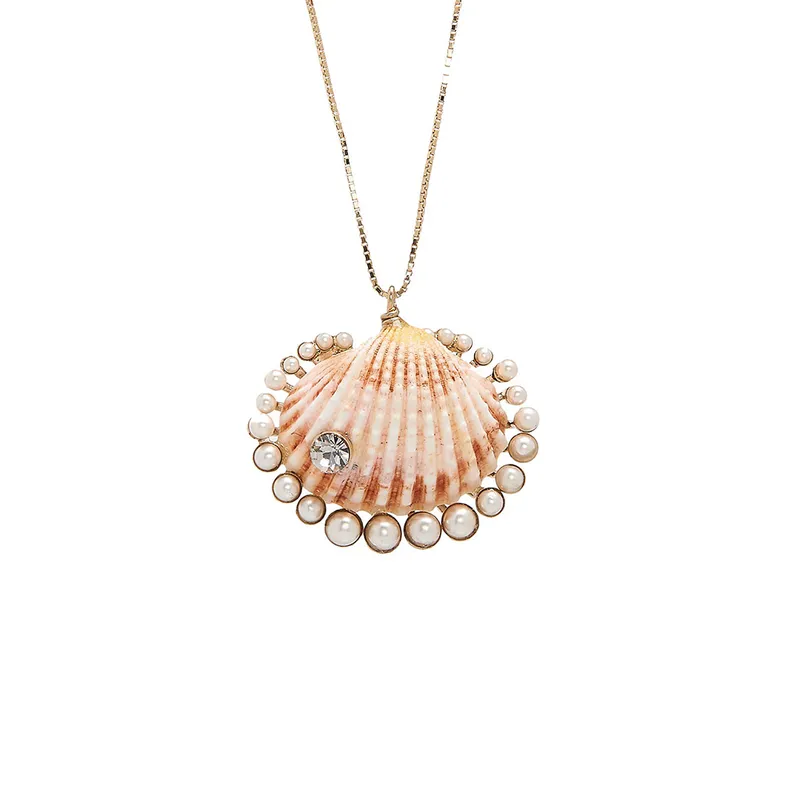 <p>Pendant necklace with faux pearl and crystal in gold tone shell</p>
