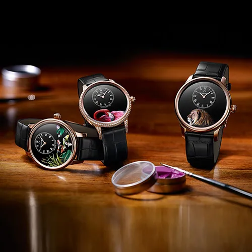 <p>Unusual versions of the watch Petite Heure Minute with miniature depictions of a Lion, Flamingo and Koi Carp</p>