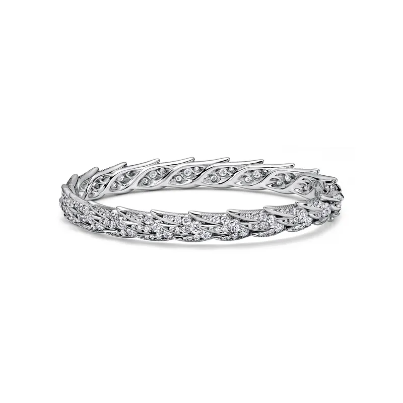 <p>Bird on a Rock by Tiffany Wings wide bangle in platinum with diamonds</p>
