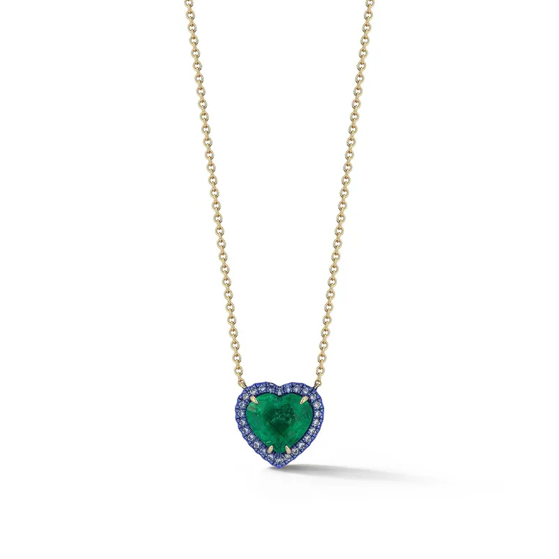 <p>Heart pendant in emerald, sapphire and yellow gold</p>