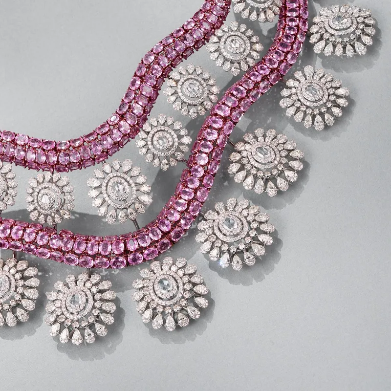 <p>A sculptural, wave-inspired pink sapphire and diamond necklace</p>