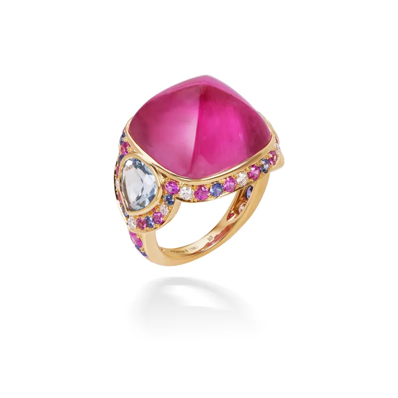 <p>Marina B Pacila high jewellery ring, set with a 20.83ct rubellite sugarloaf cabochon, pear-shaped aquamarines and pavé-set light blue and pink sapphires and diamonds in 18k yellow gold</p>