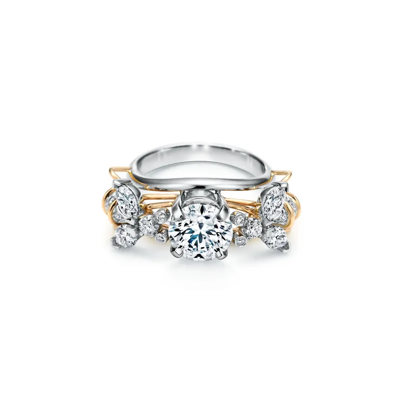 <p>Tiffany &amp; Co. Schlumberger Two Bees diamond engagement ring in platinum and 18K yellow gold.</p>
