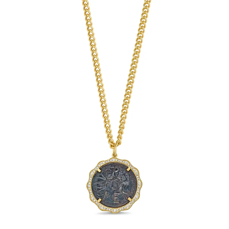 <p>Vintage Suffragette Coin with a scalloped diamond-set bezel from the Empowerment collection, set in 18k yellow gold</p>
