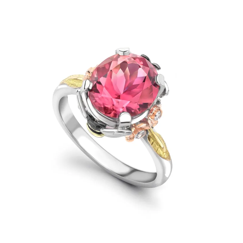 <p>Theo Fennell pink tourmaline Bee and Blossom Tryst ring in 18K white and yellow gold with diamonds.</p>
