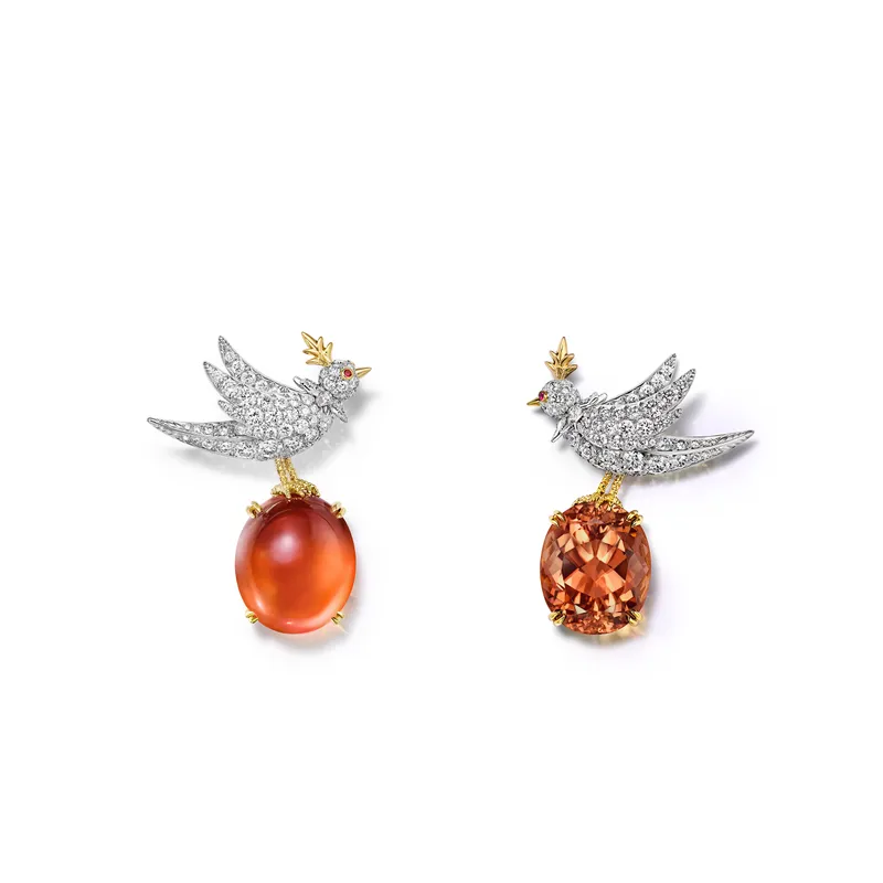 <p>Tiffany & Co. Bird on a Rock: Love Birds high jewellery brooches in platinum and 18k yellow gold, set with an with an oval cabochon spessartine of 50.91 carats and an oval orange tourmaline of 21.31 carats</p>