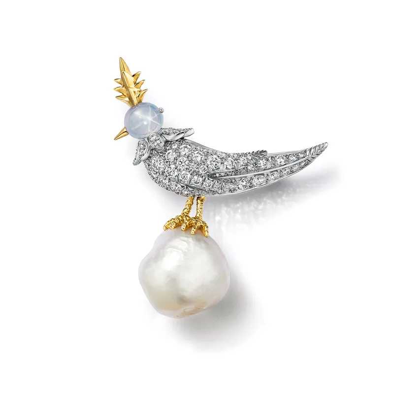 <p>Tiffany & Co. Bird on a Pearl high jewellery brooch set with a white baroque natural saltwater pearl of 27.83 carats, a star sapphire and diamonds</p>