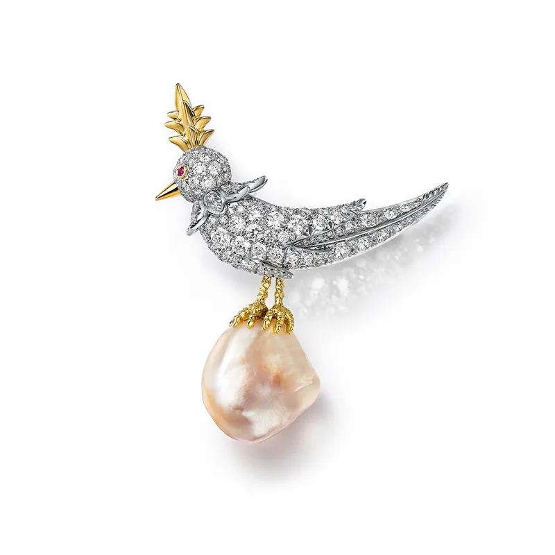 <p>Tiffany & Co. Bird on a Pearl high jewellery brooch set with a white and light orangy brown baroque natural saltwater pearl of 20.04 carats</p>