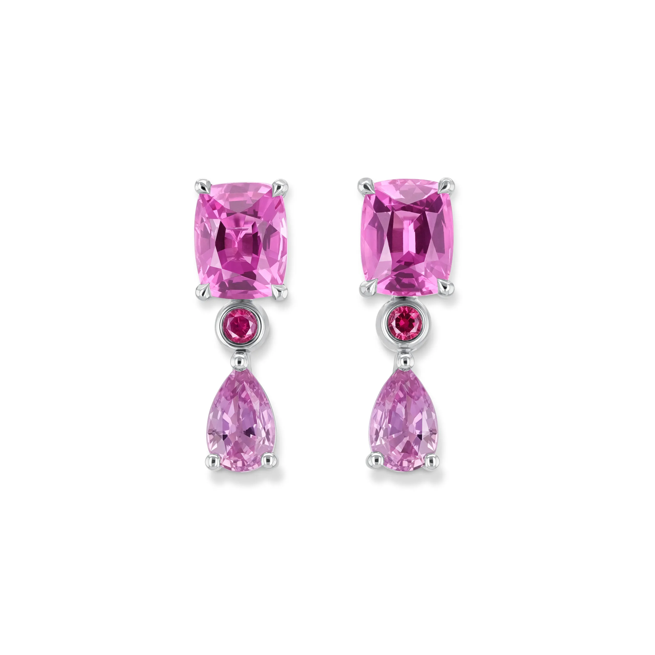 House of Gübelin earrings with two pink spinels from Tanzania each weighing exactly 1.10 carats, alongside cabochon-cut Gübelin rubies from Greenland and two pear-shaped lilac sapphires