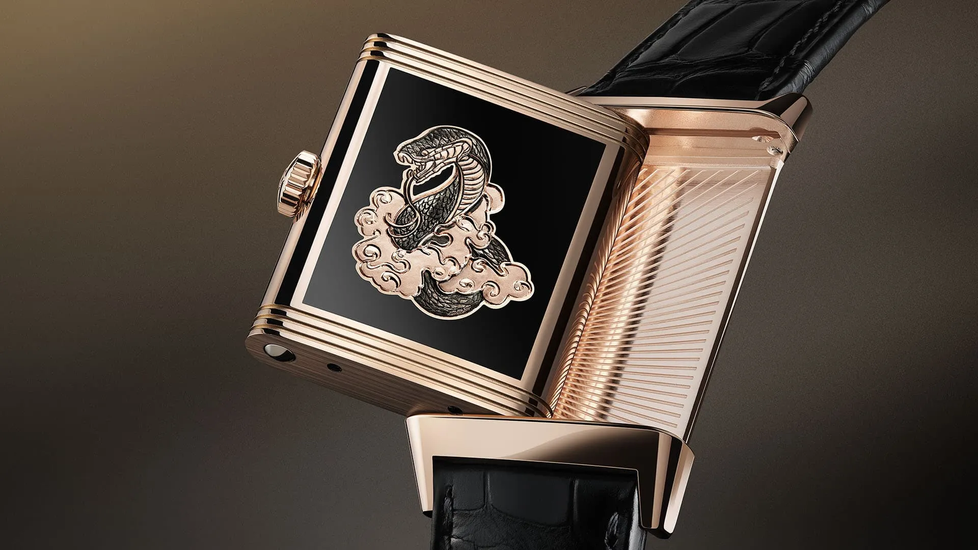 Jaeger-LeCoultre Reverso Tribute Enamel Snake watch with hand-drawn black rhodium scales, sandblasted textured cloud and 18k pink gold