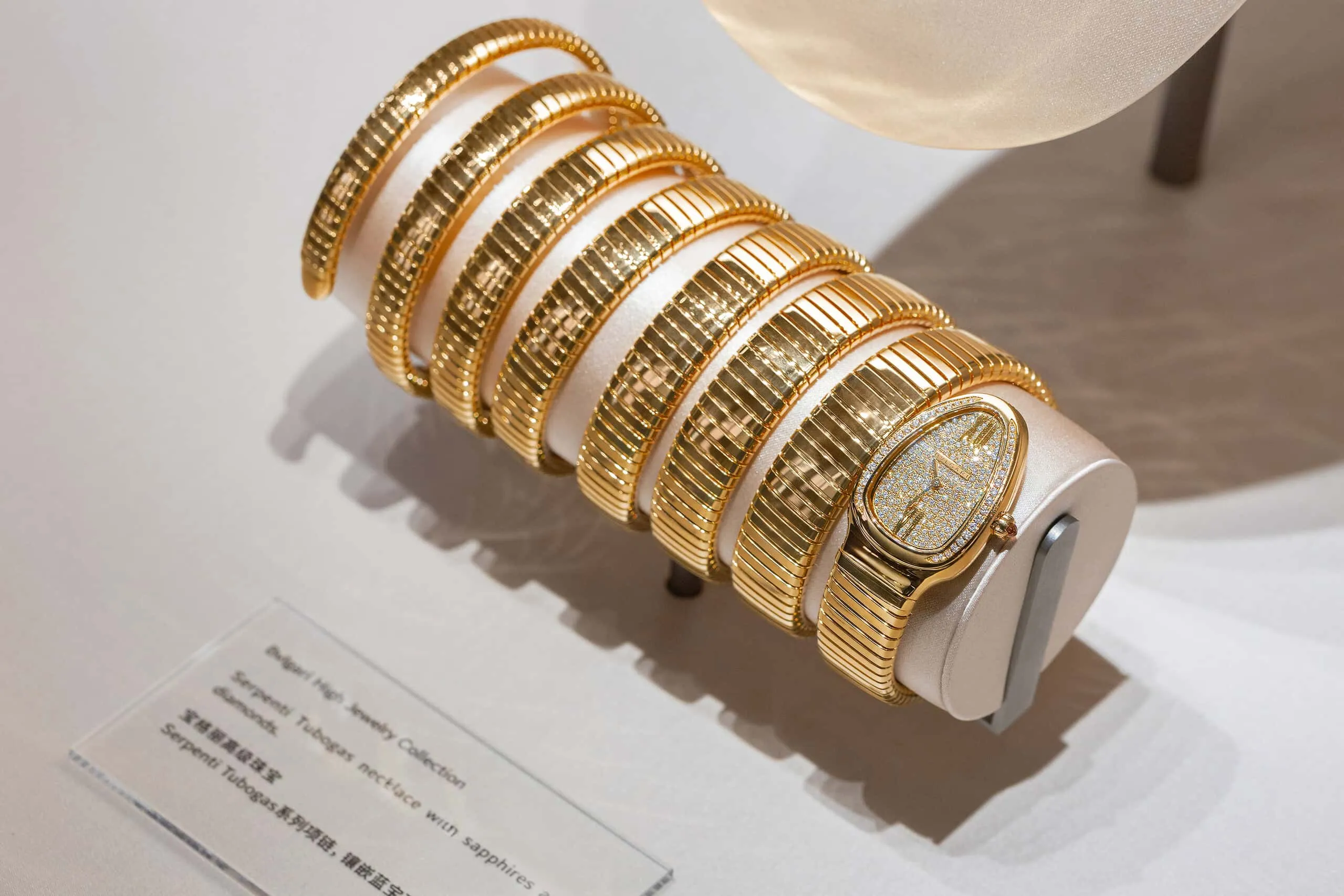A Bvlgari Serpenti Tubogas High Jewellery watch in yellow gold that is on display at the Serpenti Infinito exhibition in Shanghai 