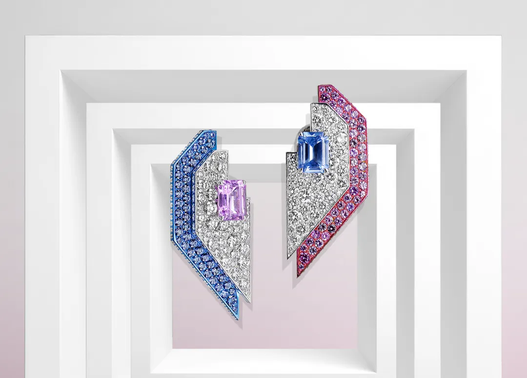 Mayiana MY Geometry earrings with a 0.82-carat pink sapphire, a 0.77-carat blue sapphire, further pink and blue sapphires, and 1.73 carats of diamonds set in 18k white gold and pink and blue titanium 