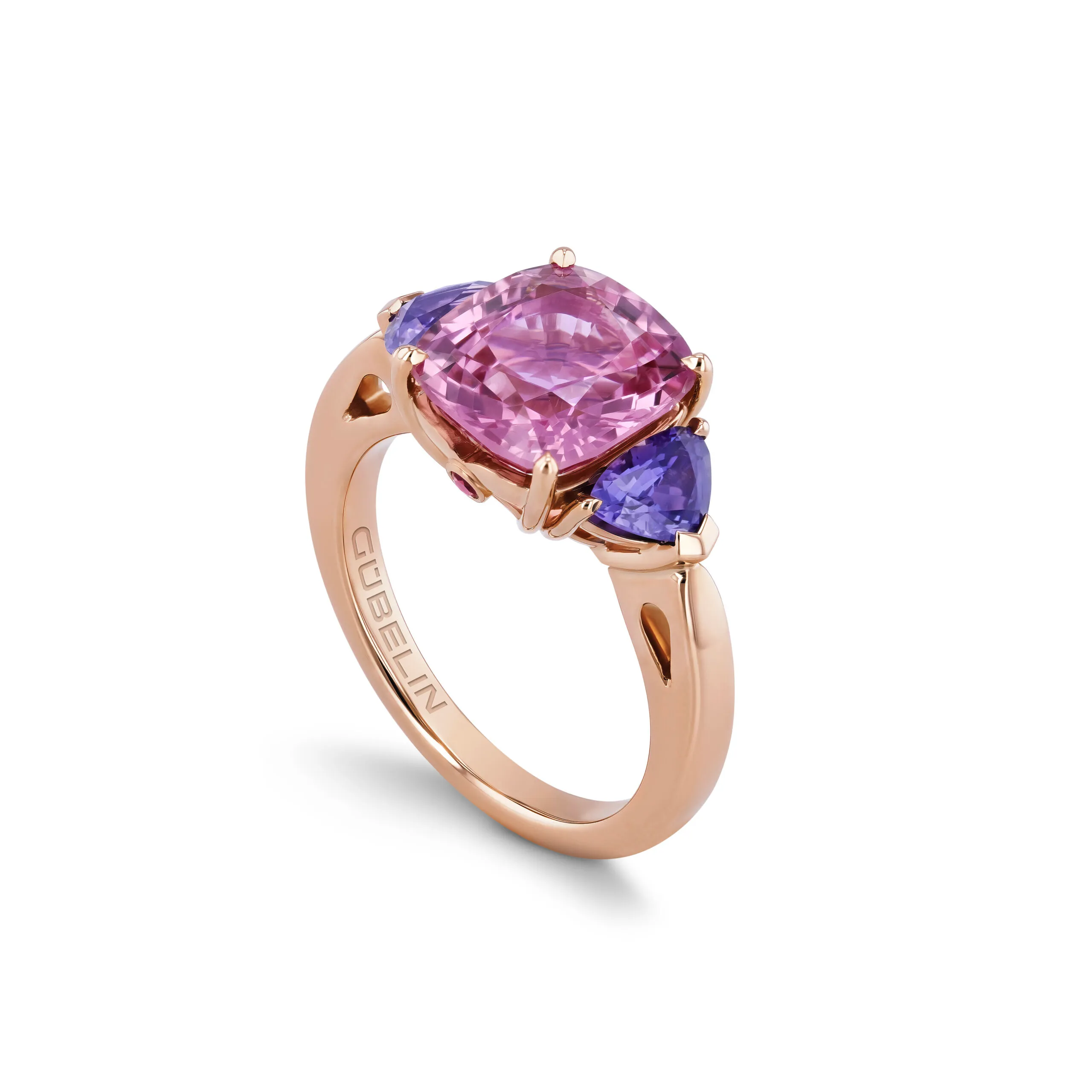House of Gübelin ring with a 4.29 carat purplish-pink spinel from Burma (Myanmar) set alongside two lavender-coloured sapphire trilliants in red gold 