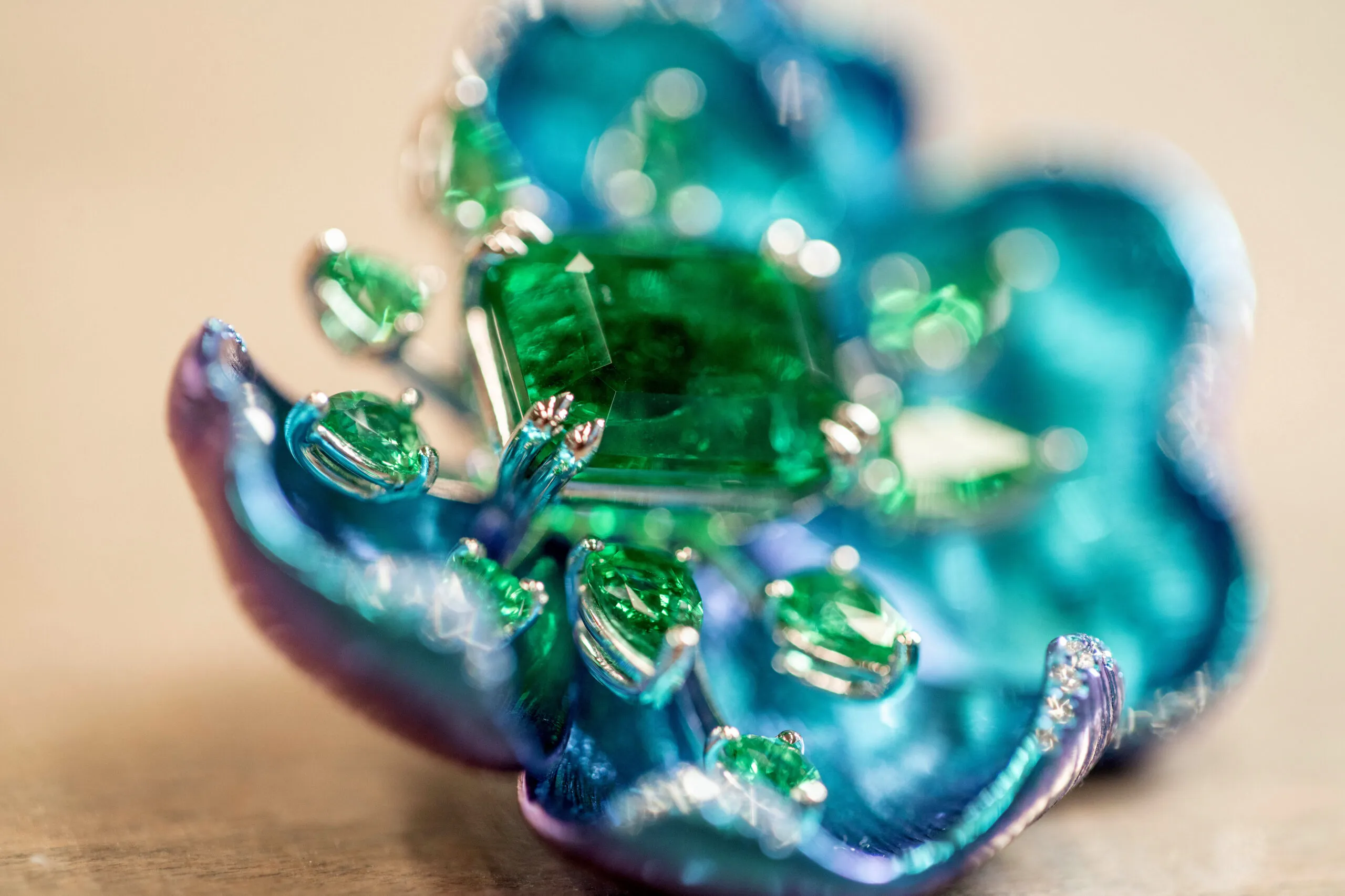 Floral earrings from Chopard’s Insofu collection in the making, crafted in 18-carat white gold, platinum and titanium, set with emeralds and brilliant-cut diamonds