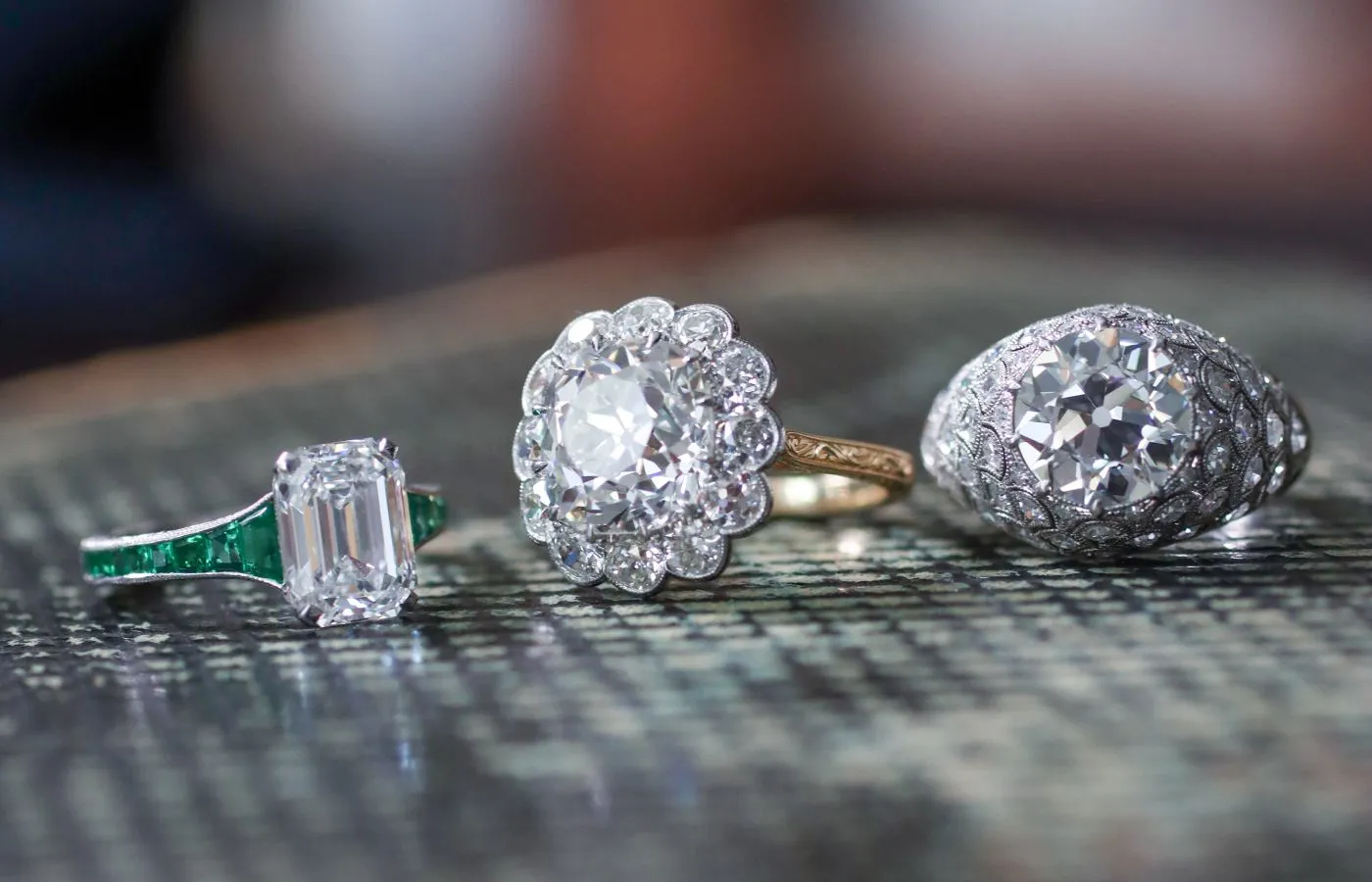 <p>A selection of Hancocks antique rings including a 2.85ct emerald-cut diamond and emerald ring, a 5.08ct Old Mine cushion-cut diamond Cluster ring and a 3.12ct Old European brilliant-cut diamond Bombe Style ring</p>
